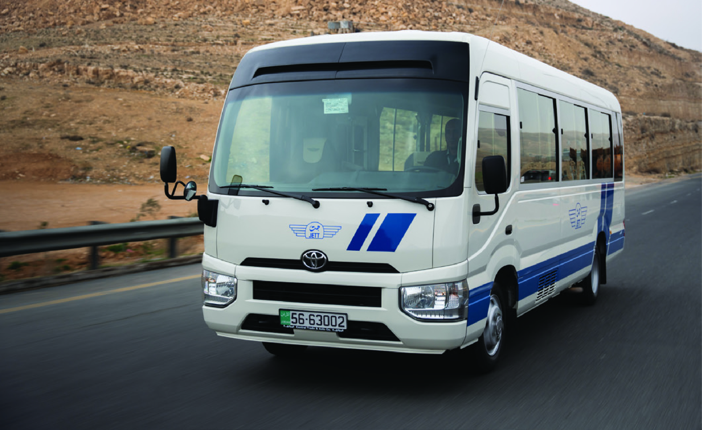 Coaster minibus used for group tours in Jordan
